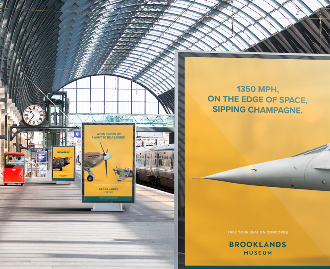Brooklands Museum brand advertising in railway station