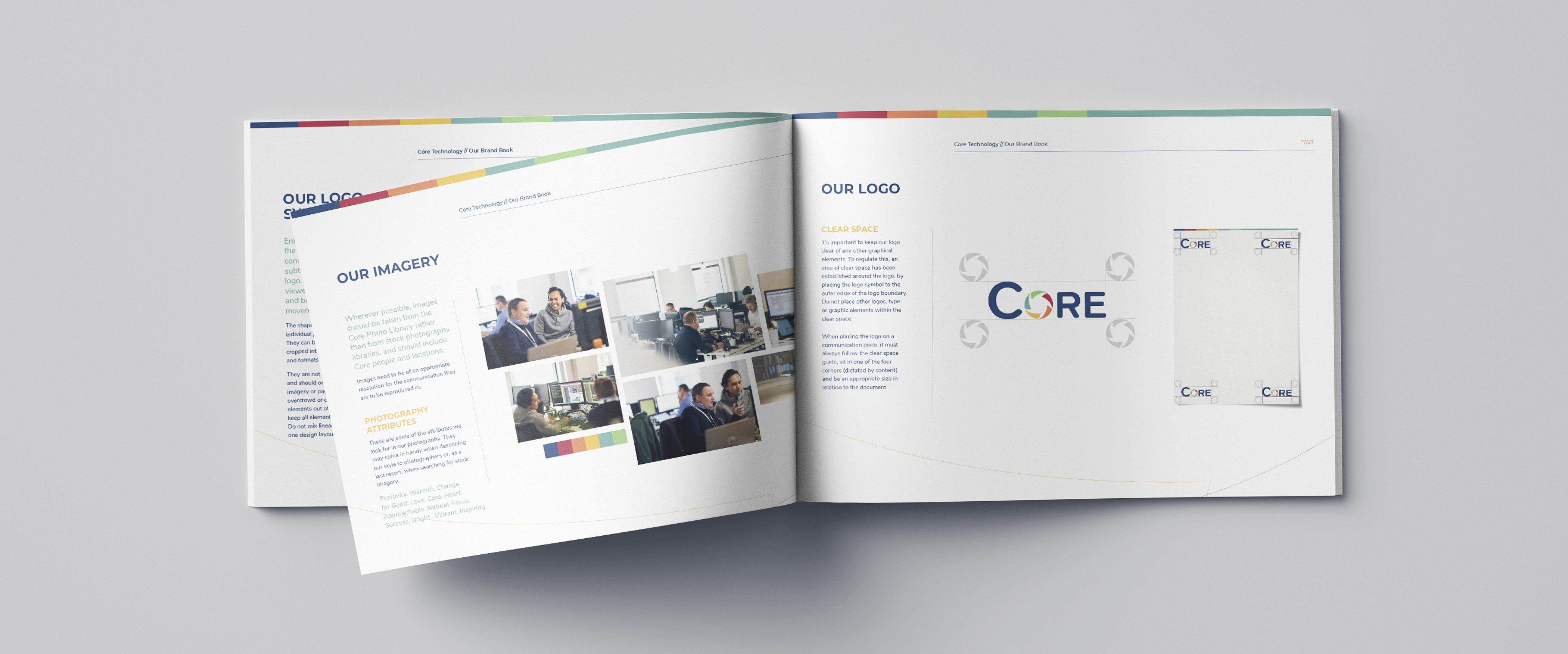 Core Brand Book open on a desk