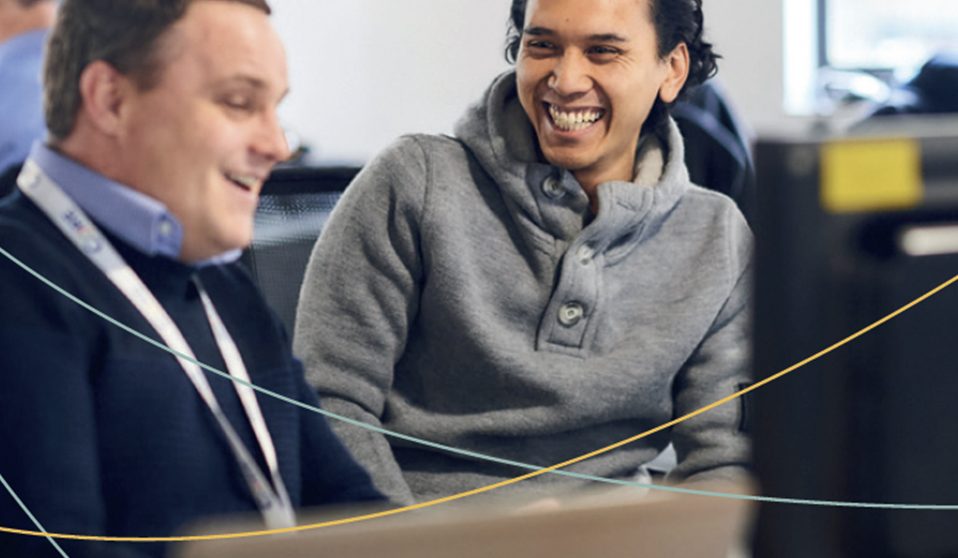 Core team members laughing during photoshoot