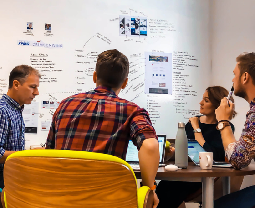 Looking at white wall during a creative meeting