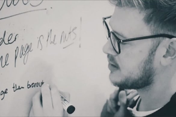 Man writing on a white board