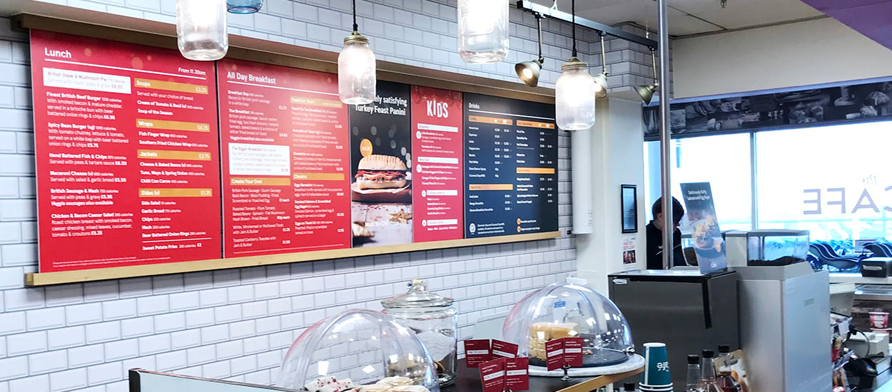 Printed menu board in a Tesco Cafe