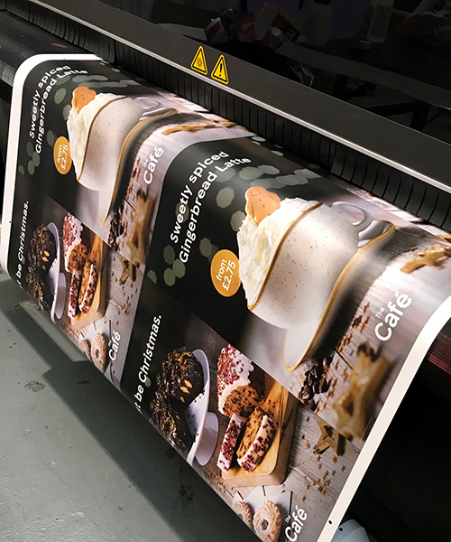 Tesco Cafe posters being printed on a inkjet printer