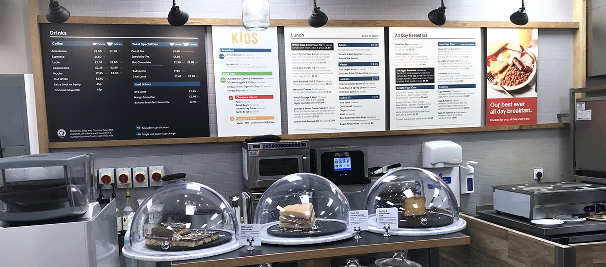 Printed menu display boards in a Tesco Cafe