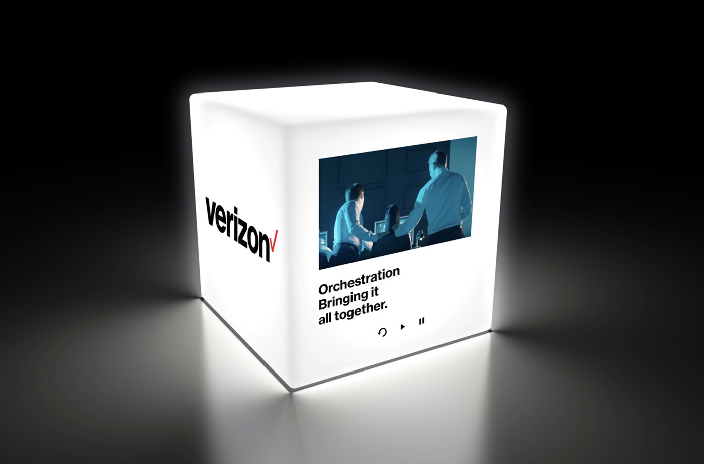 Verizon cube lit up on black background